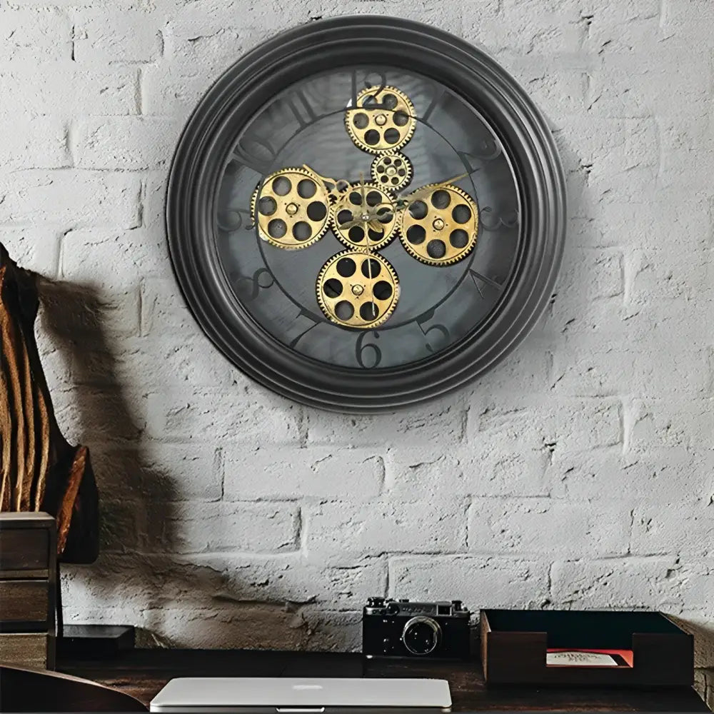 Industrial vintage wall clock detail showing metal frame and gear accents