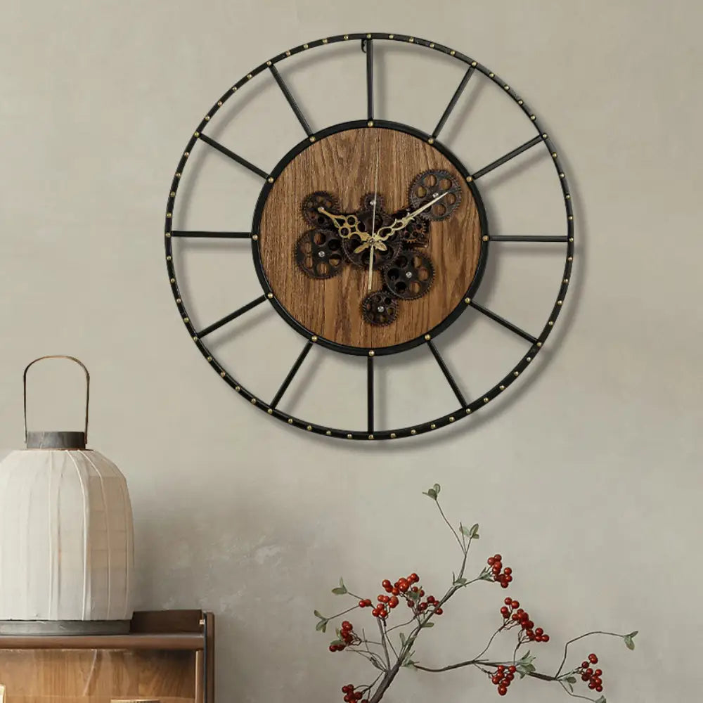 close-up of gear details on industrial wood and metal wall clock