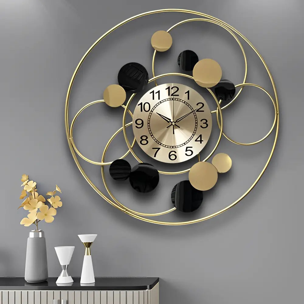 Large gold modern wall clock hanging in living room