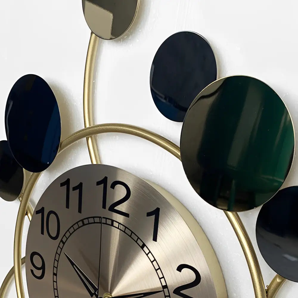 Close-up of gold metal clock face with sweep hands