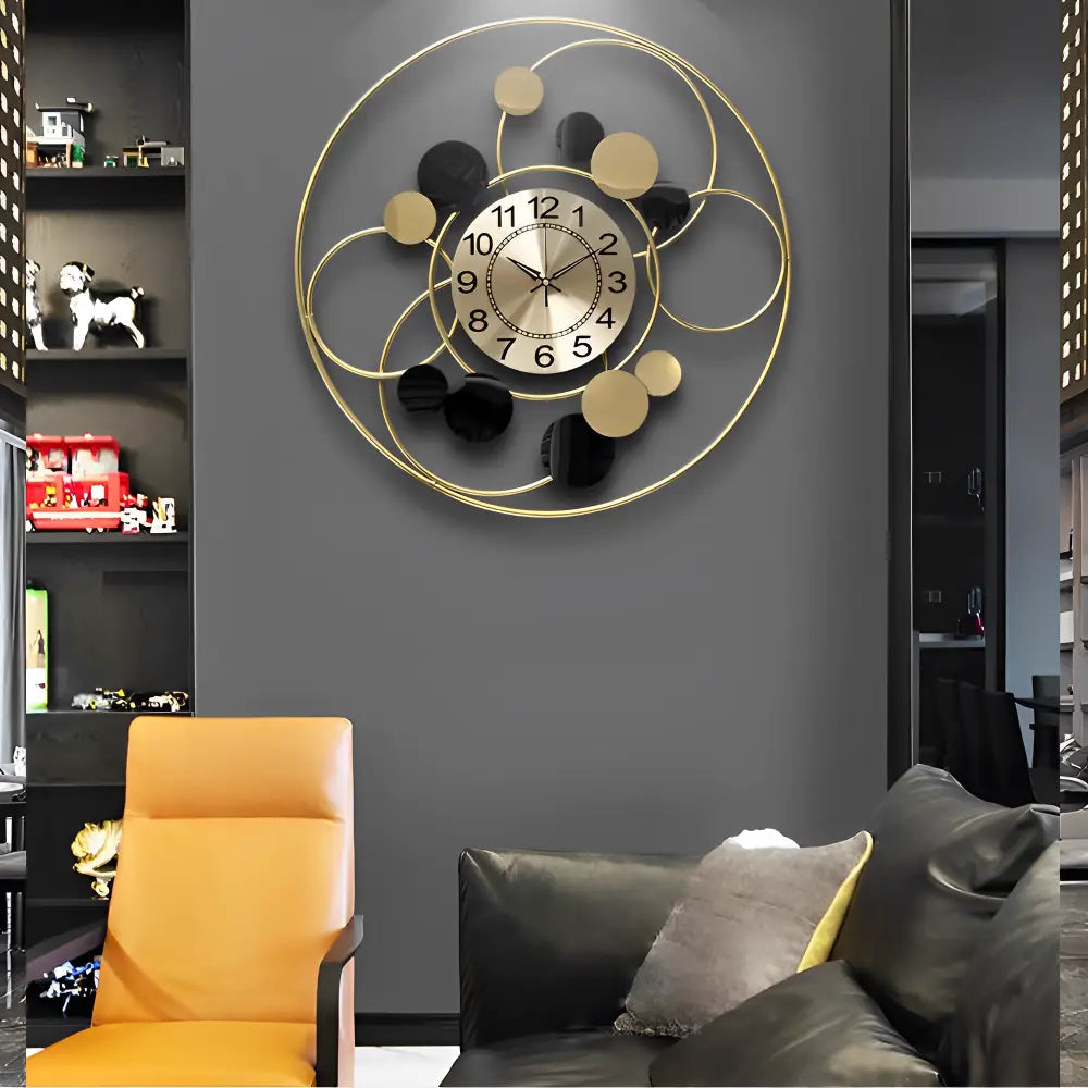 Gold designer wall clock styled in contemporary interior