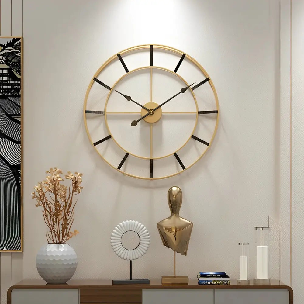 Close-up of gold metal wall clock hands and slim 9 mm profile