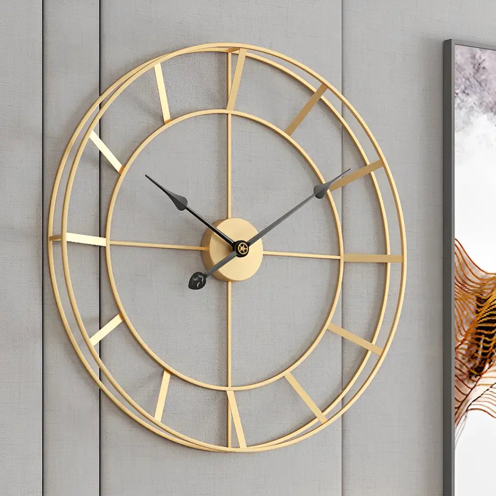 Gold and black minimalist wall clock displayed in modern living room