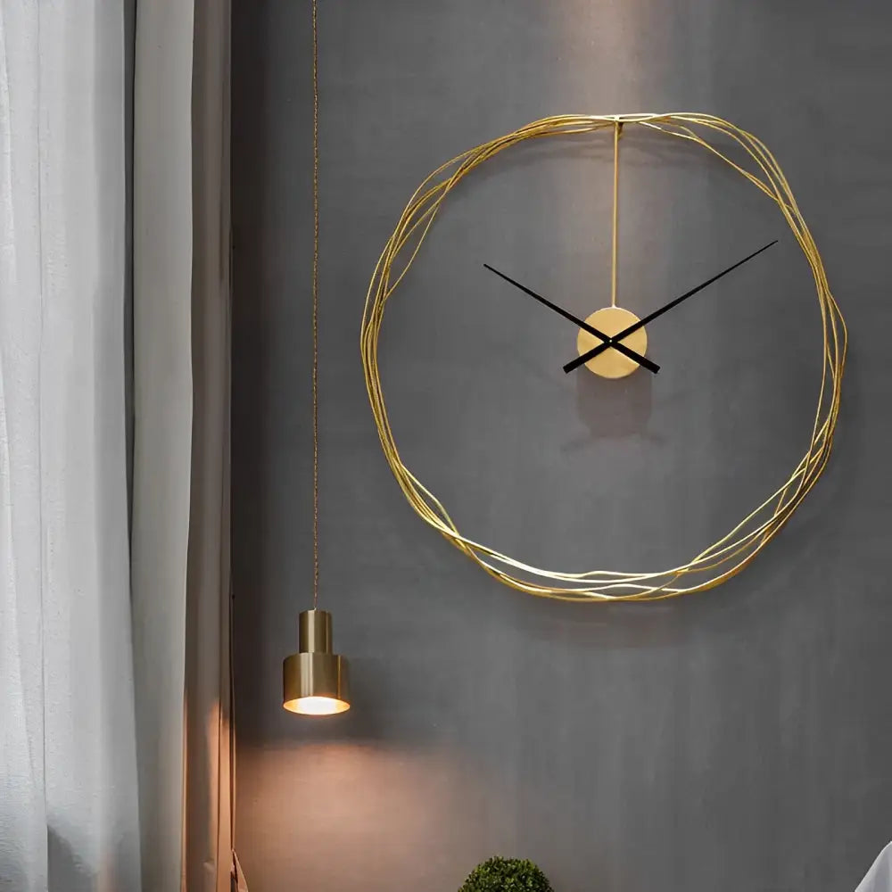 Close-up of gold wire circle clock analog dial and hands