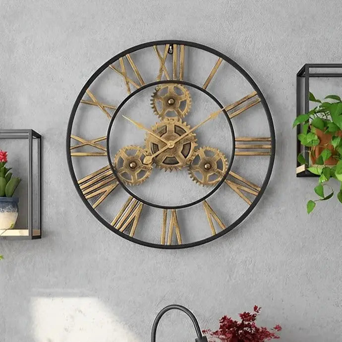 Close-up of aged gold gear details on industrial metal wall clock
