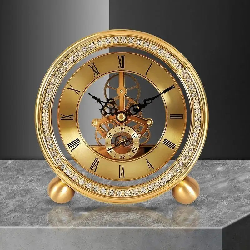 Close-up of exposed mechanism on gold brass desk clock