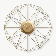Large 80 cm metal wall clock with gold hands on a white wall