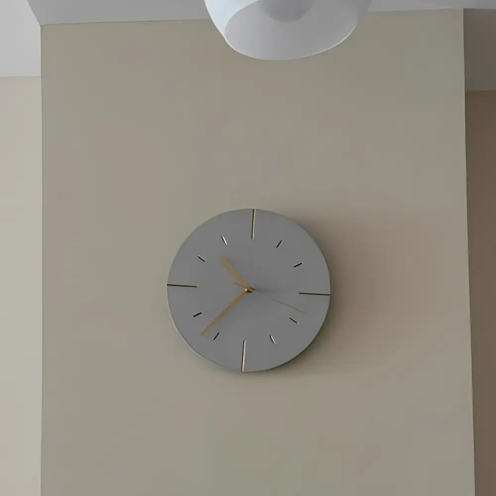 Close-up of sand-blend material texture on cement style wall clock