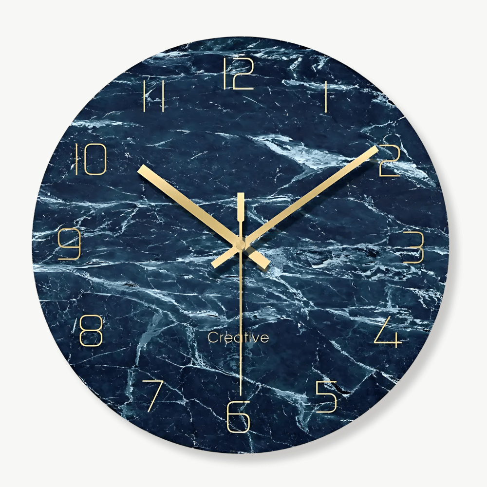 Designer glass wall clock with subtle crystal pattern on white wall