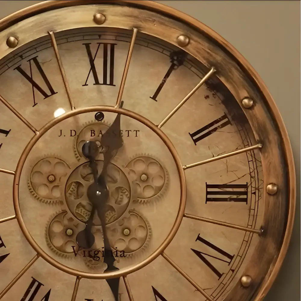 Close-up of iron clock hands and gear mechanism on steampunk wall clock
