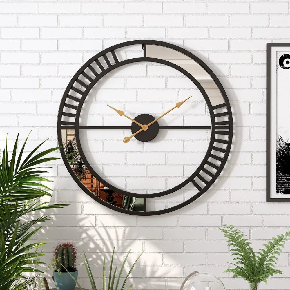 Gold industrial wall clock with integrated mirror accent on white wall