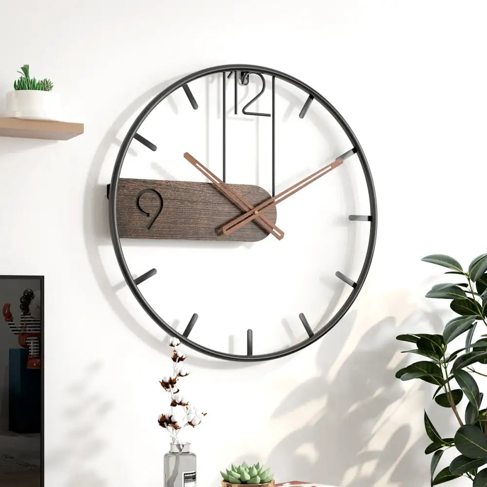 Close-up of silent quartz movement and walnut-style hands on metal wall clock