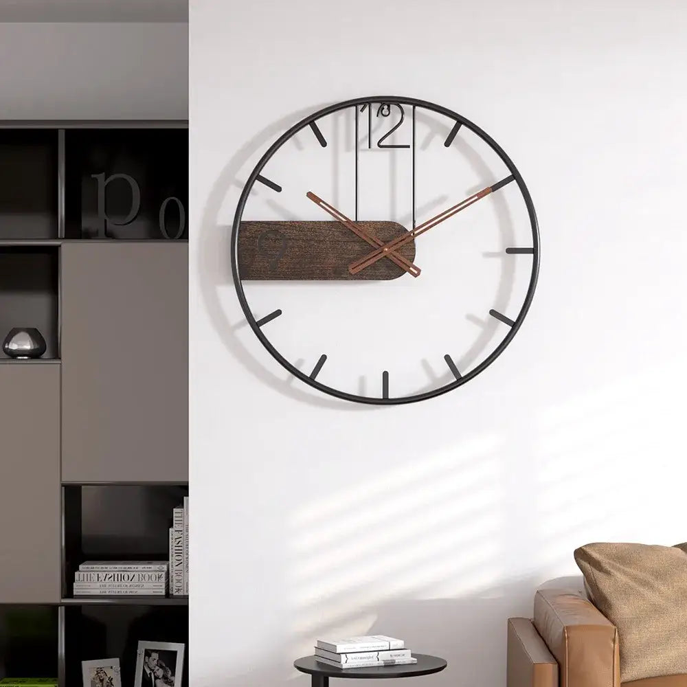 Industrial wall clock mounted above living room sofa