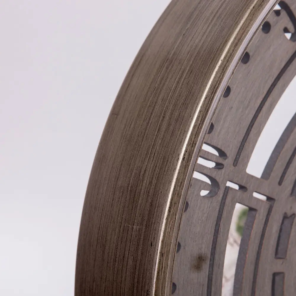 Side profile of Spin Time wall clock showing 8 cm depth and metal shell