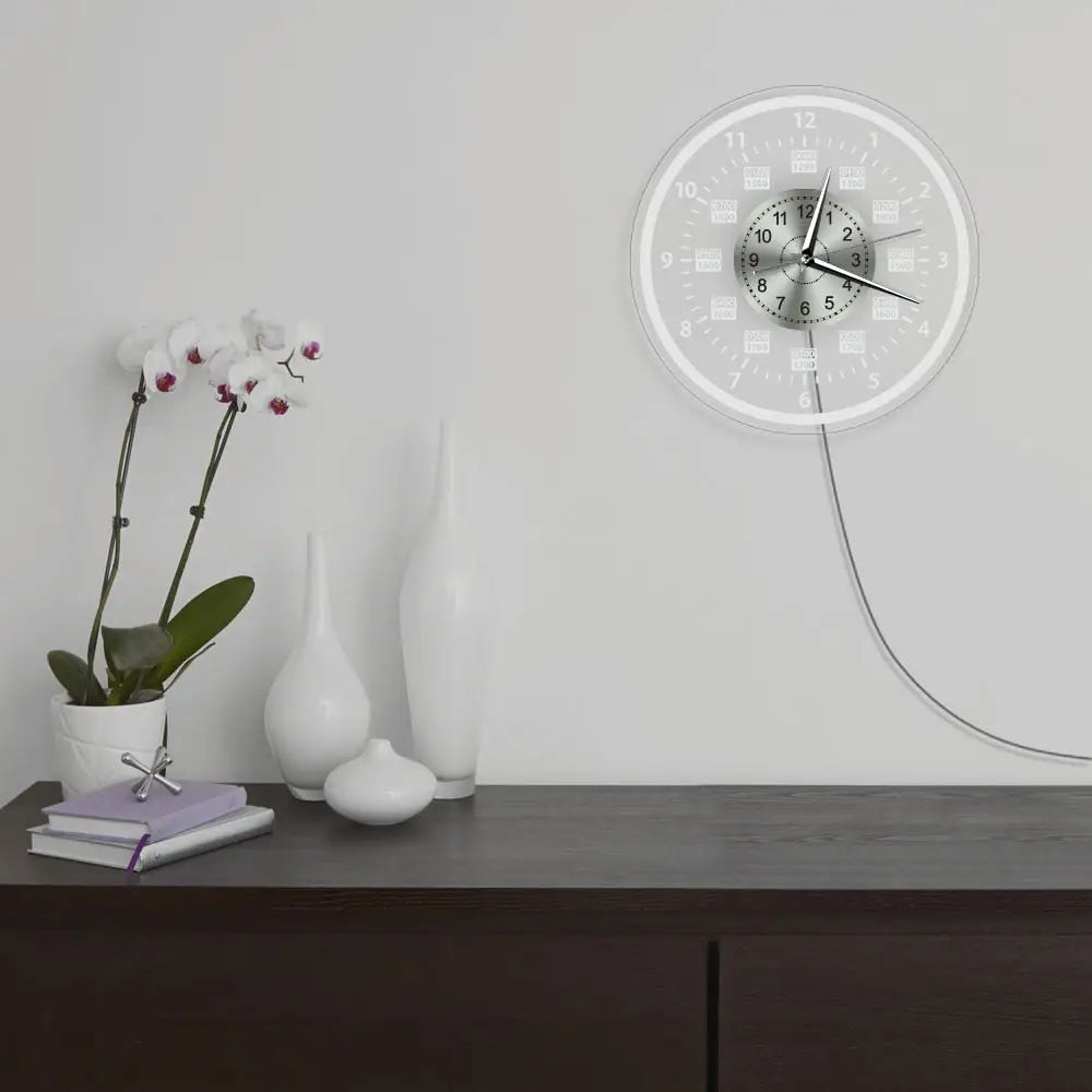 modern circular wall clock lit up in dark room