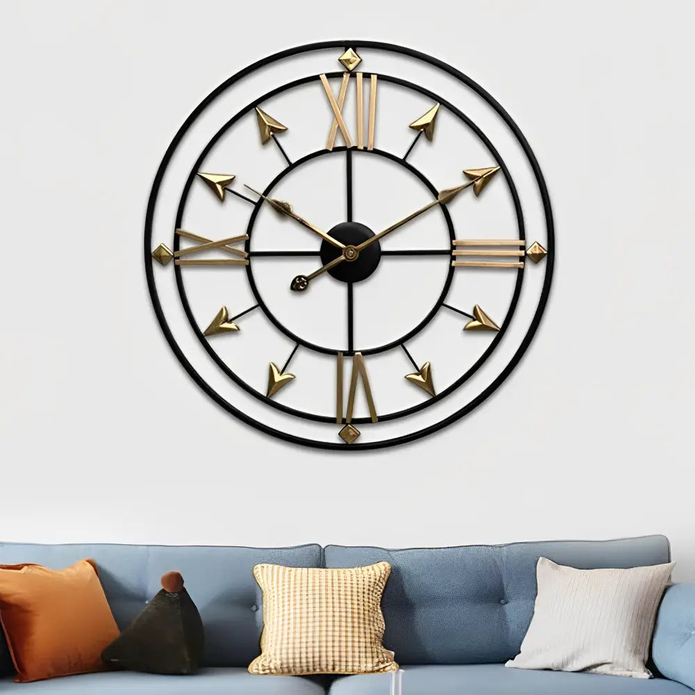 large silver metal wall clock hanging in modern living room