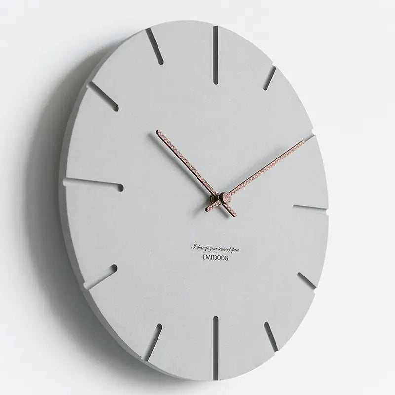 Roman Numeral style minimalist wood wall clock in a modern bedroom