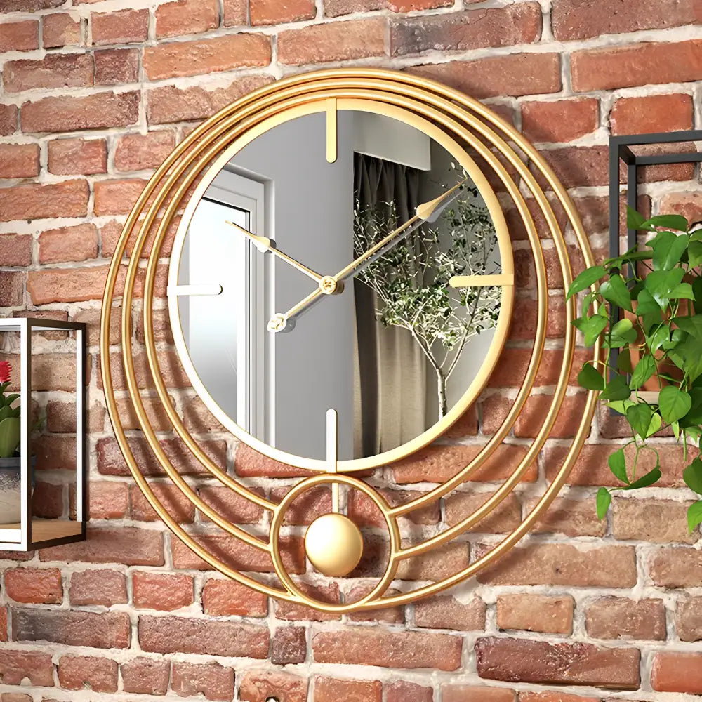 Gold finish mirror circle wall clock close-up showing analog hands