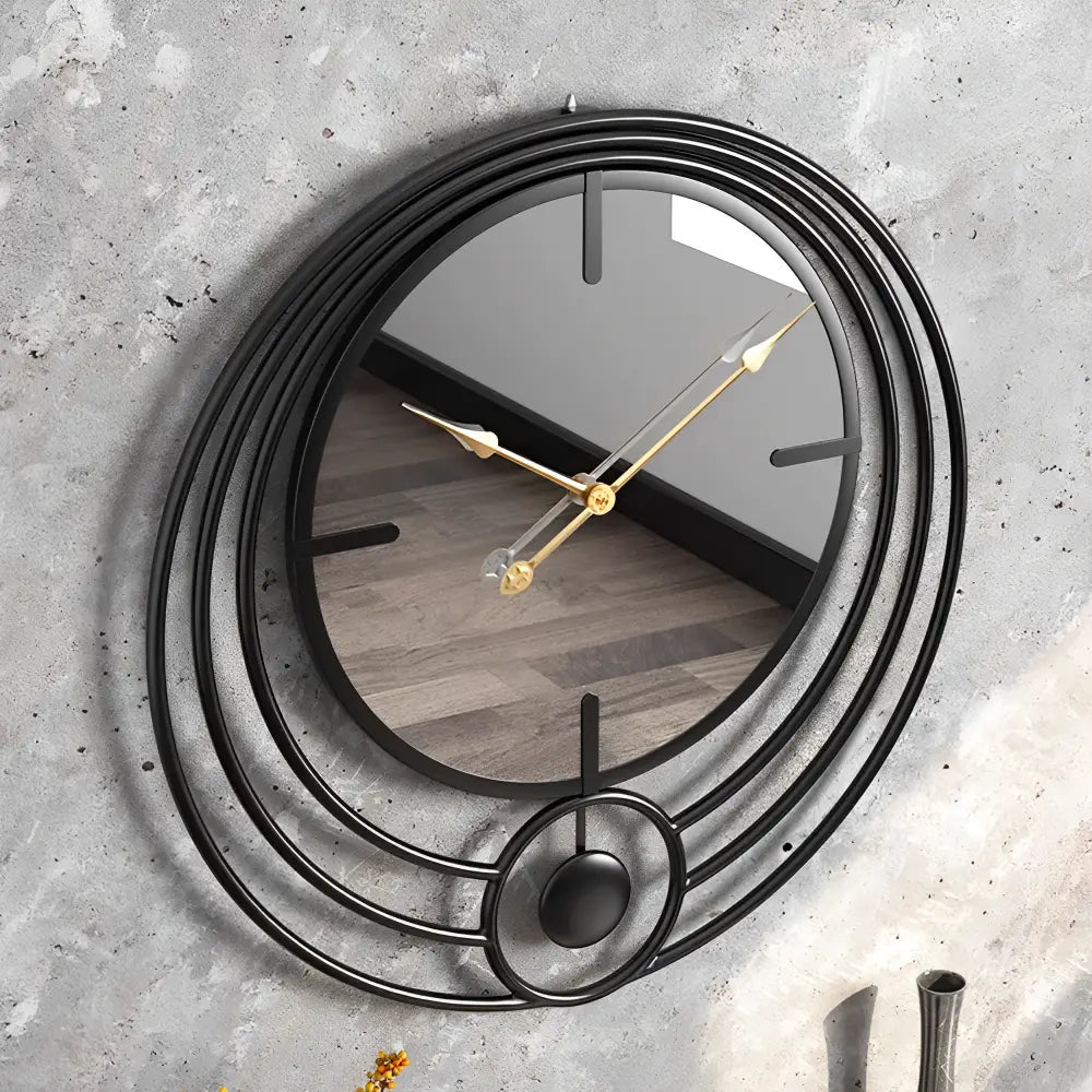 CasaClock mirror circle wall clock in gold against a neutral wall
