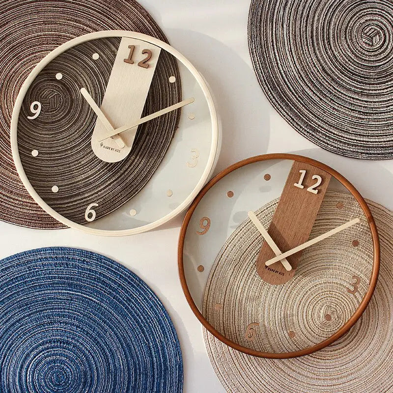 White wood wall clock with organic glass dial and analog hands, minimalist design