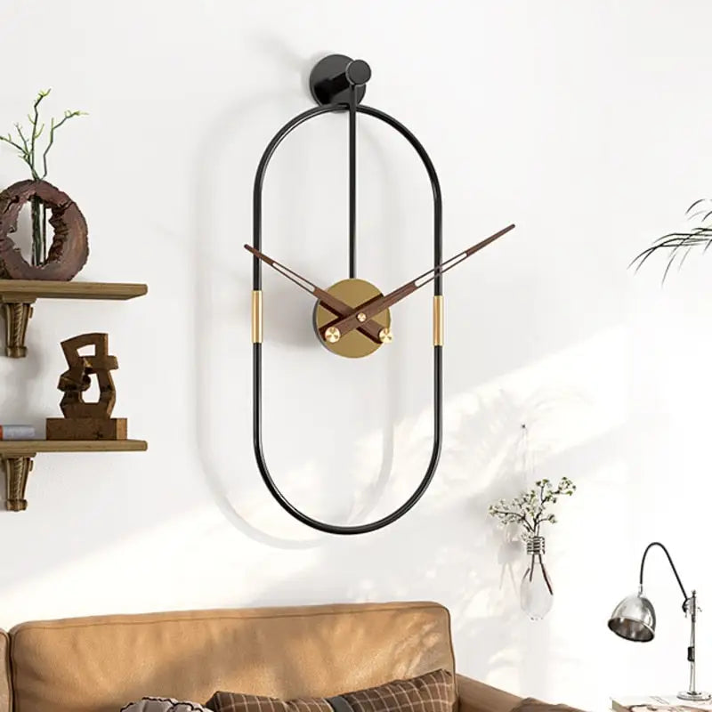 Oval wall clock displayed above a sofa in a contemporary interior