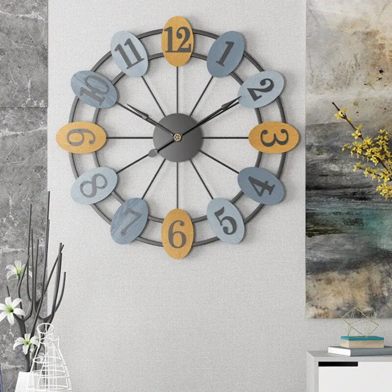 Industrial metal wall clock displayed in a bedroom setting