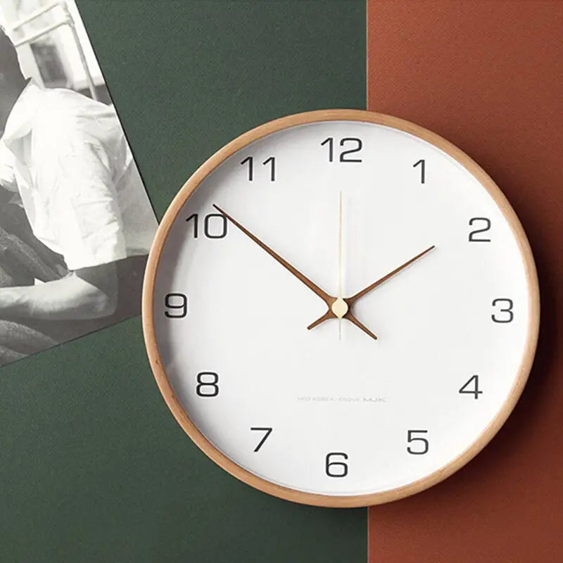 Minimalist wood wall clock 35 cm hanging in a modern kitchen