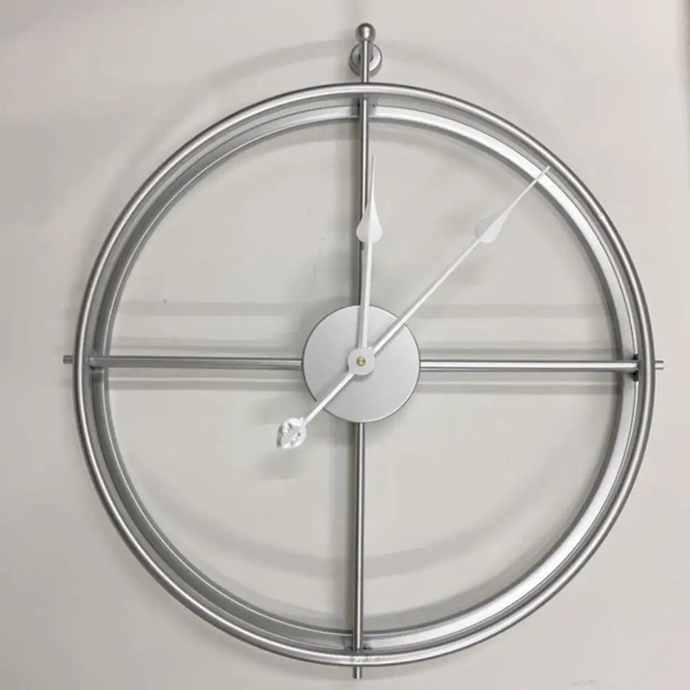 Black and gold hands detail on 50 cm retro metal wall clock