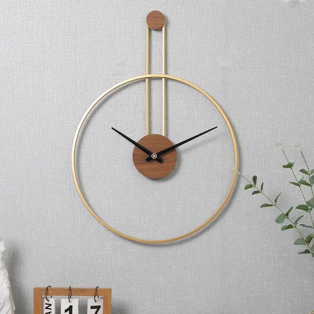 Three color variants of suspended circle wall clock - black, gold, and silver