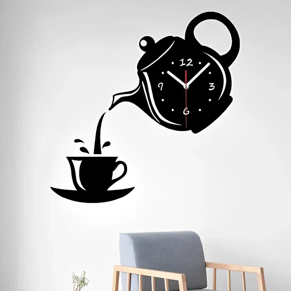 Close-up of acrylic teapot wall clock with analog hands in gold