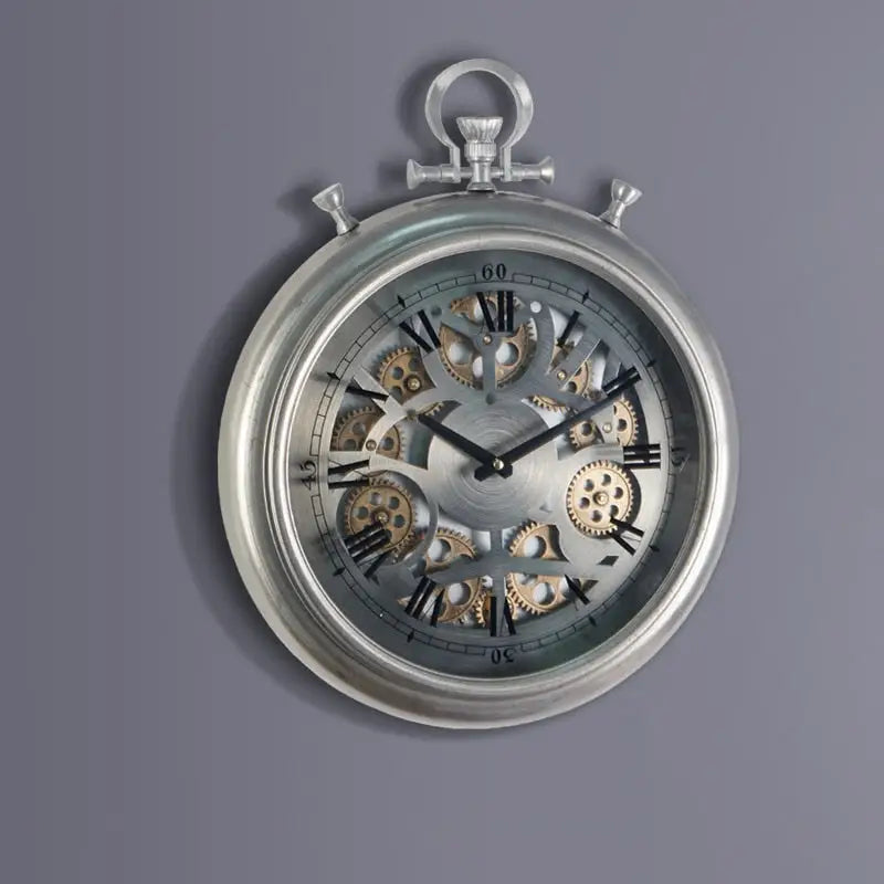 Battery-powered gear wall clock with analog hands and durable plastic body