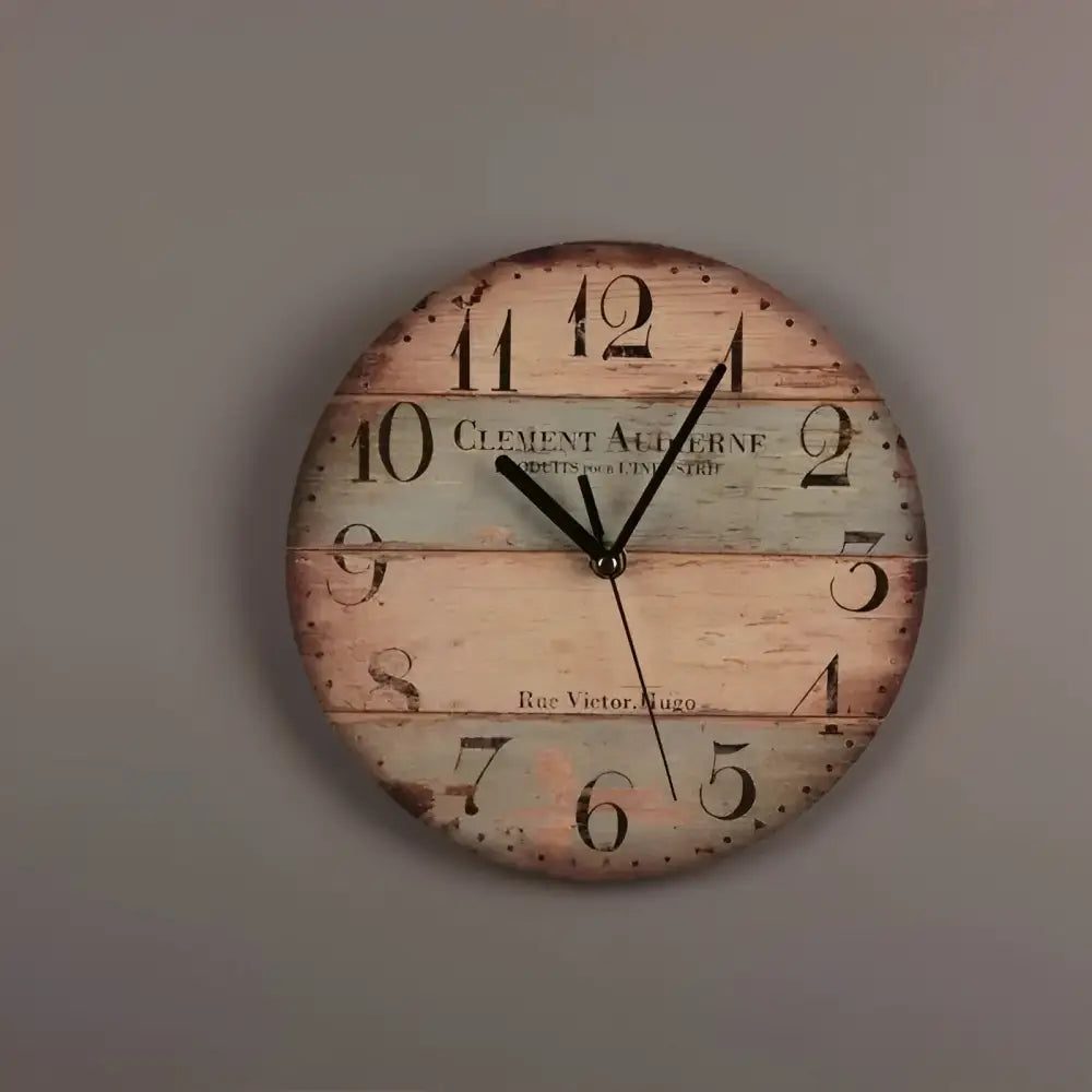 Round 23 cm rustic wood wall clock close-up showing worn dial detail