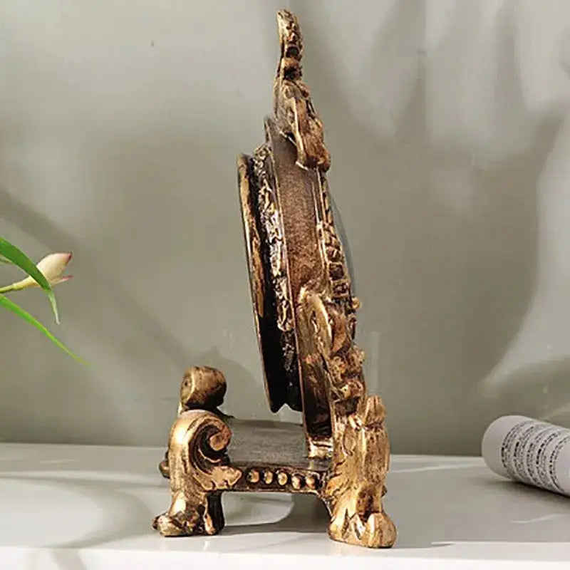 Natural resin body vintage tabletop clock side profile view