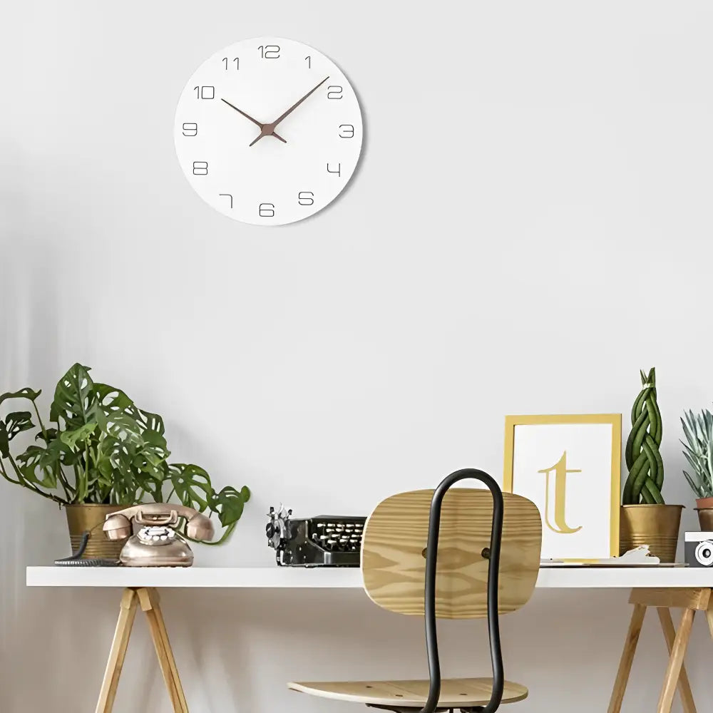 Silent analog wall clock in white wood mounted on living room wall