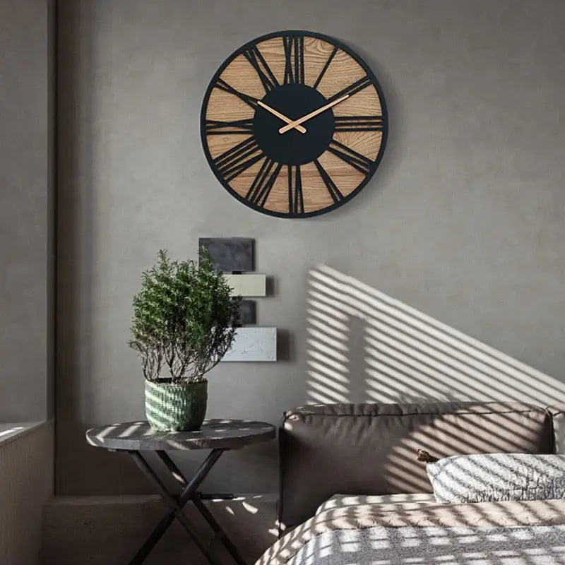 Close-up of black Roman numerals on 25 mm thick wood clock face