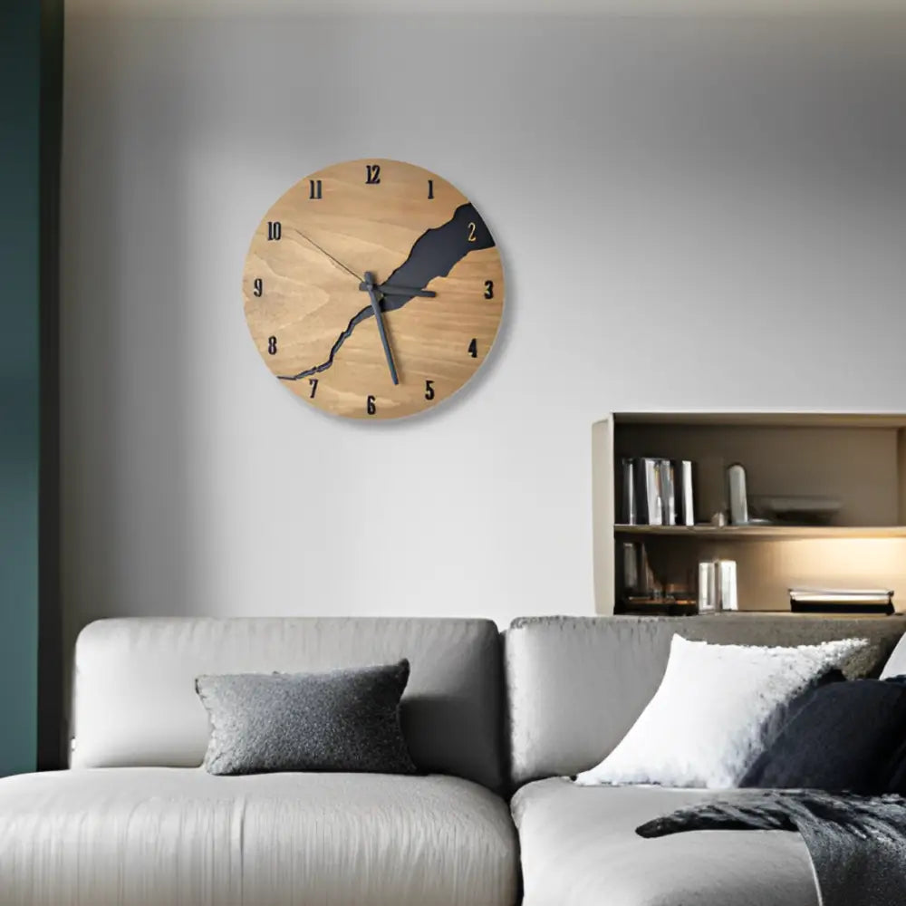 Close-up of crackled wood dial and clock hands on a modern wooden wall clock