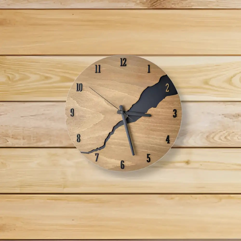 Back view of wooden wall clock showing AA battery compartment and hanging hook